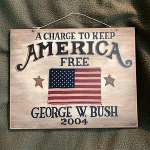 Karen Popp George W Bush wall handing. Approx 10” x 9 1/4” including hanger